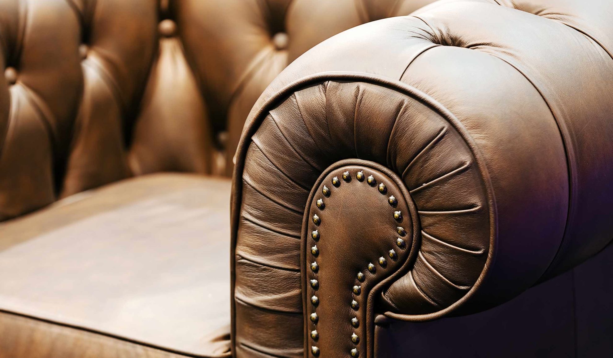 upclose-of-brown-leather-love-seat-shreveport-la