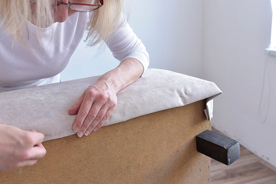 woman-working-on-furniture-upholstery-shreveport-la